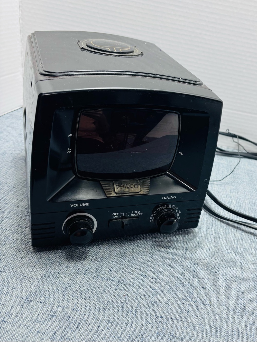Black Portable Clock Radio with Tuning and Volume Controls